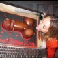 SHOCKING PICS: Miley Cyrus getting freaky with a penis cake